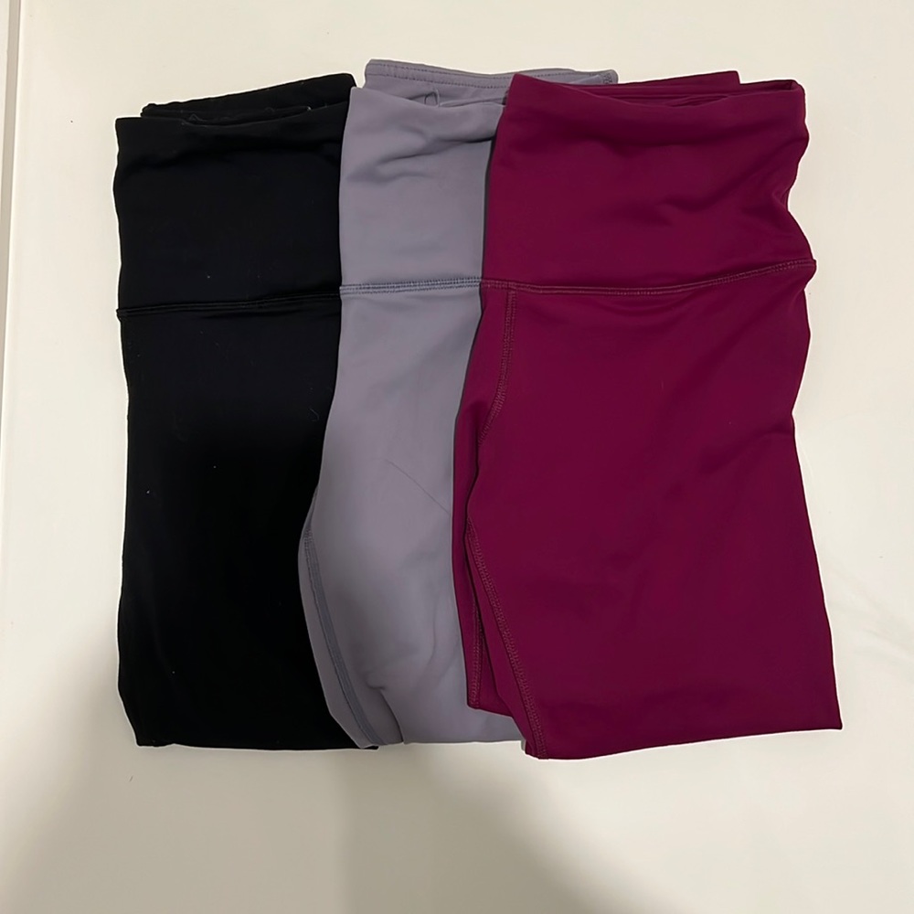 Lot of 3 . 90 degree athletic leggings . Hit above ankle. Worn size small.